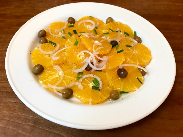 2 Amys salad of orange-segments topped with sliced red onions, olives and chives