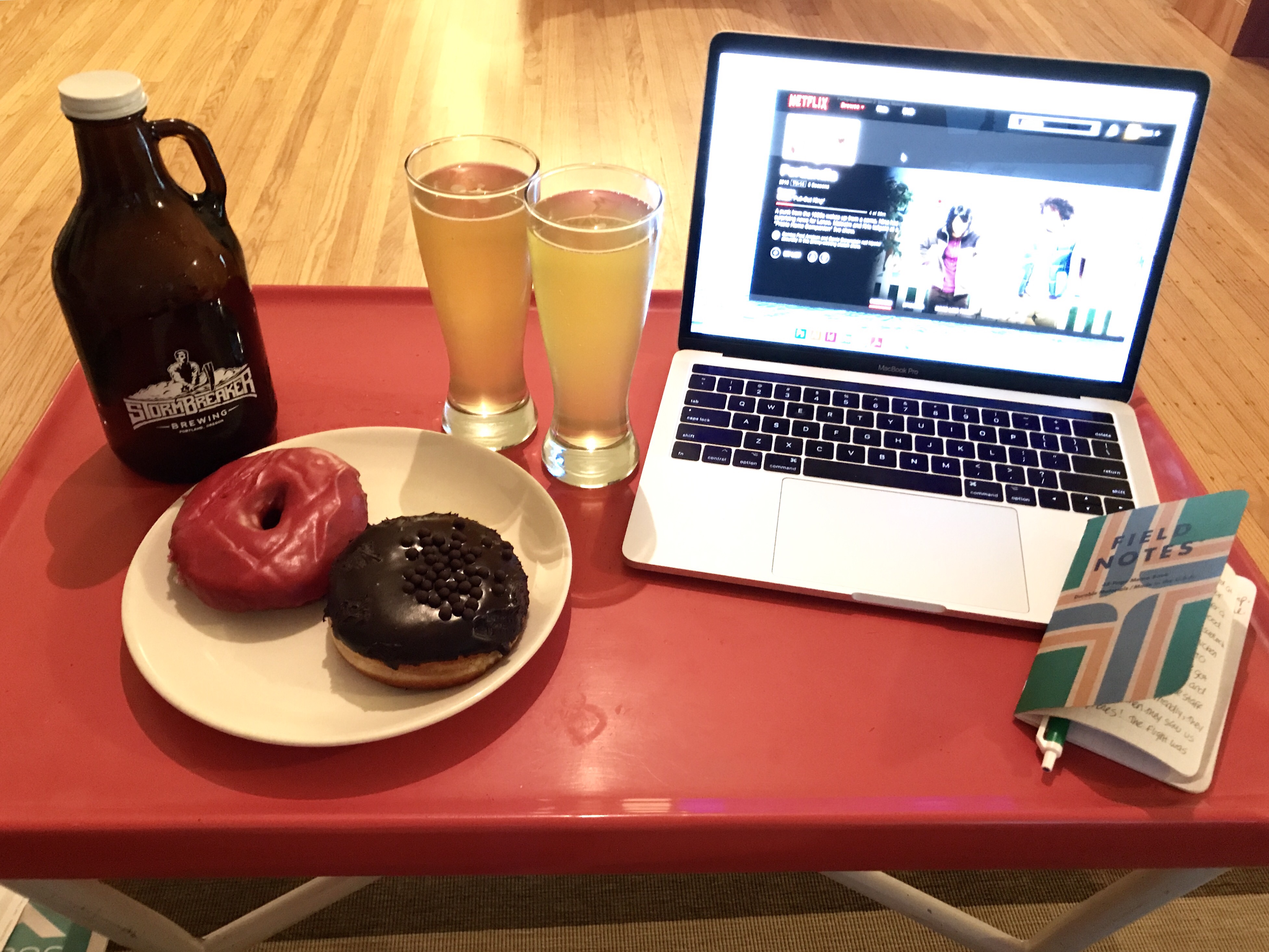 Blue Star Donuts, Stormbreaker Brewing growler and Portlandia on Netflix in our Airbnb in Portland