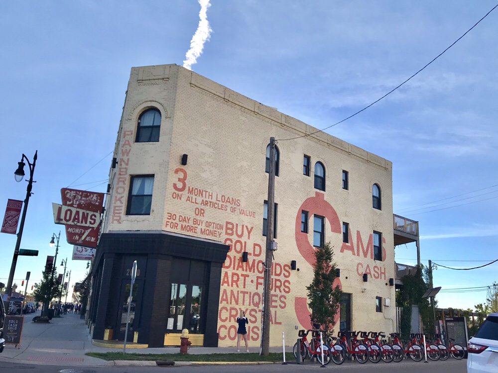 Standing outside of Gold Cash Gold restaurant in Detroit