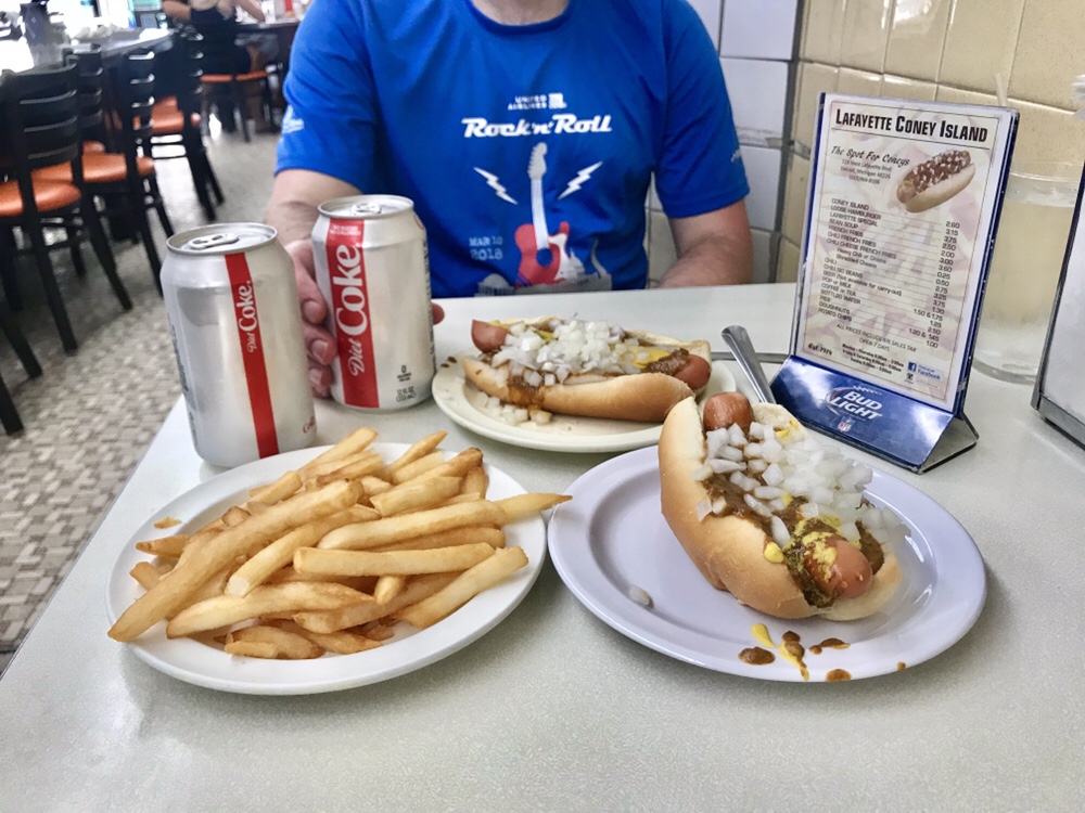 Paul eating a Detroit coney dogs at Lafayette
