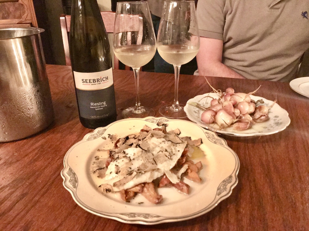 Park Place Cafe olive oil poached tile fish and bottle of wine in Merchantville, NJ