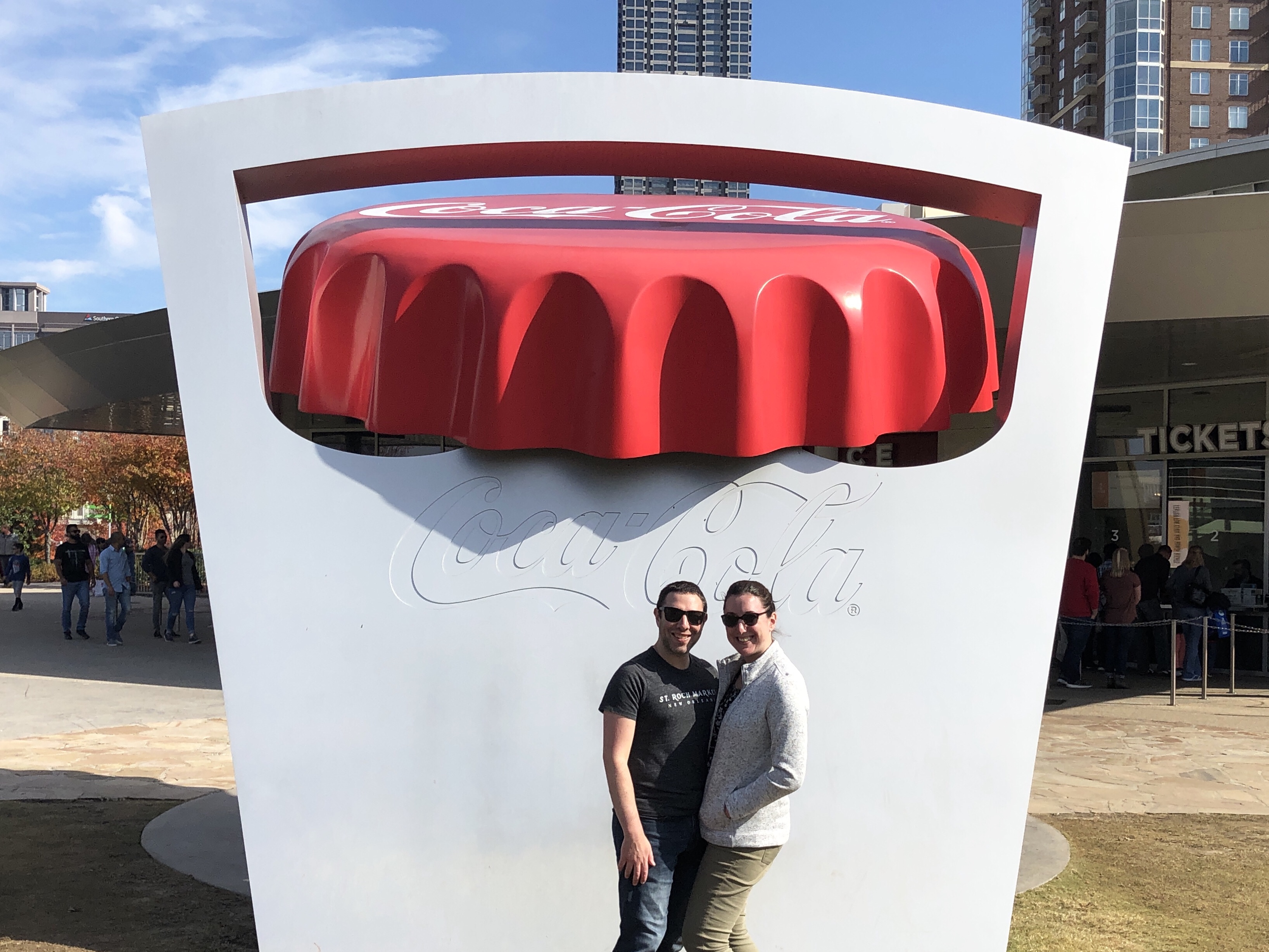 Marnay and Paul at the Coca Cola sign in Centennial Olympic Park in Atlanta