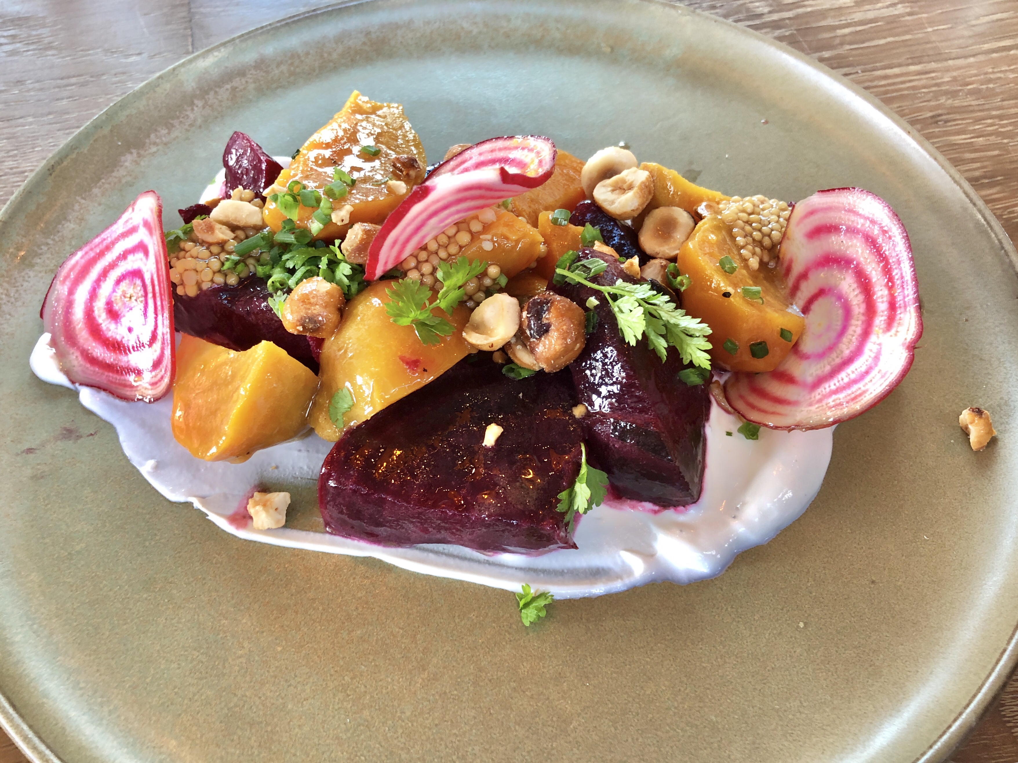 Ember-roasted beets with sheep's milk yogurt and candied hazelnuts at Rye Street Tavern in Port Covington, Baltimore, Maryland