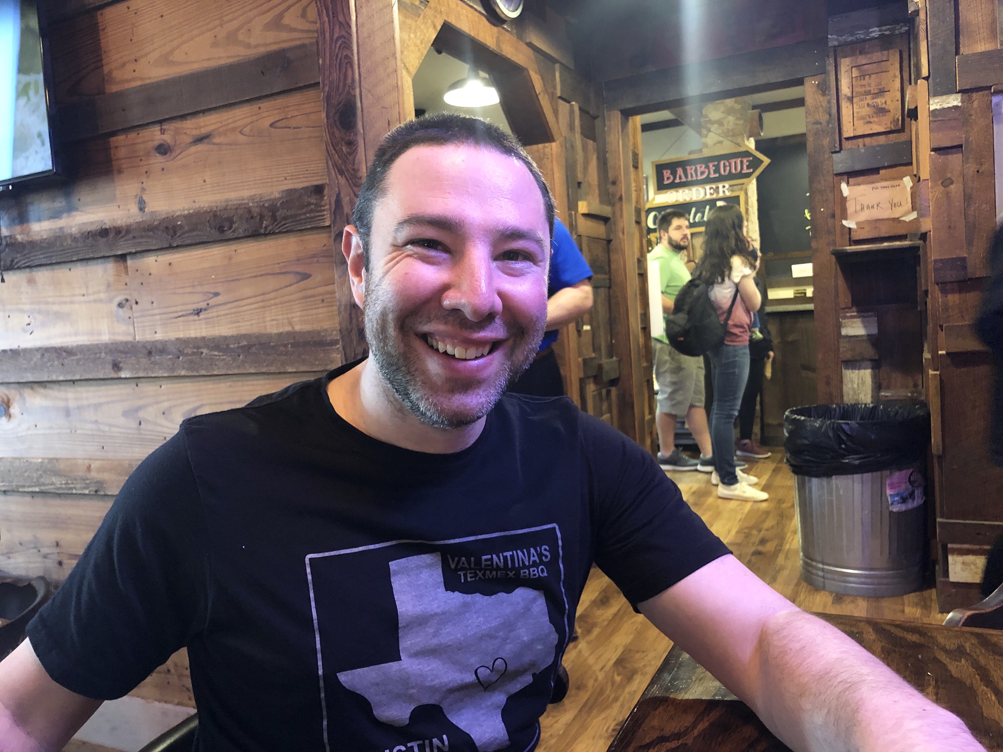 Paul eating barbecue at Tejas Chocolate in Houston, Texas
